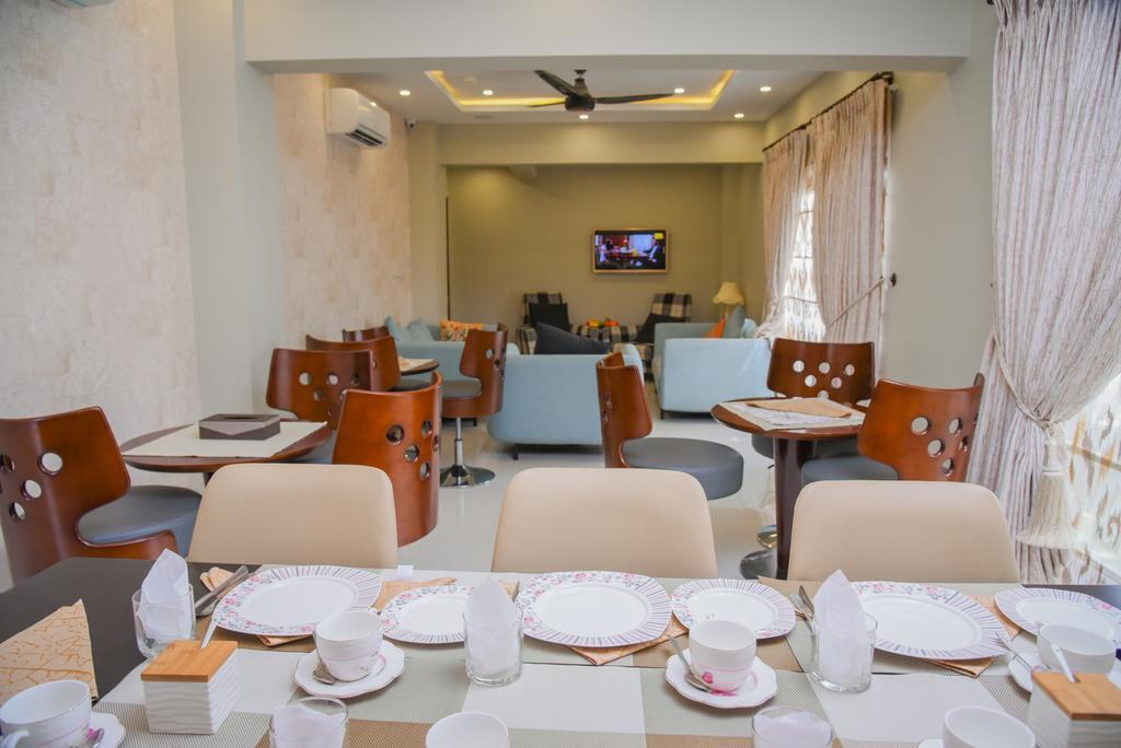 Orchards Cottage Hotel Karachi Buitenkant foto