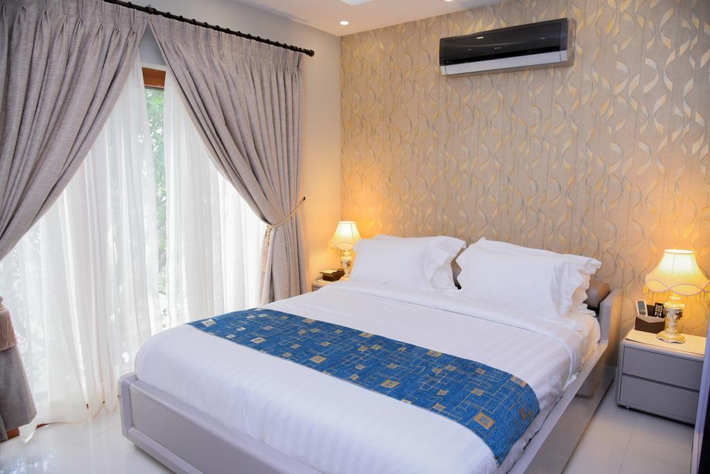 Orchards Cottage Hotel Karachi Buitenkant foto