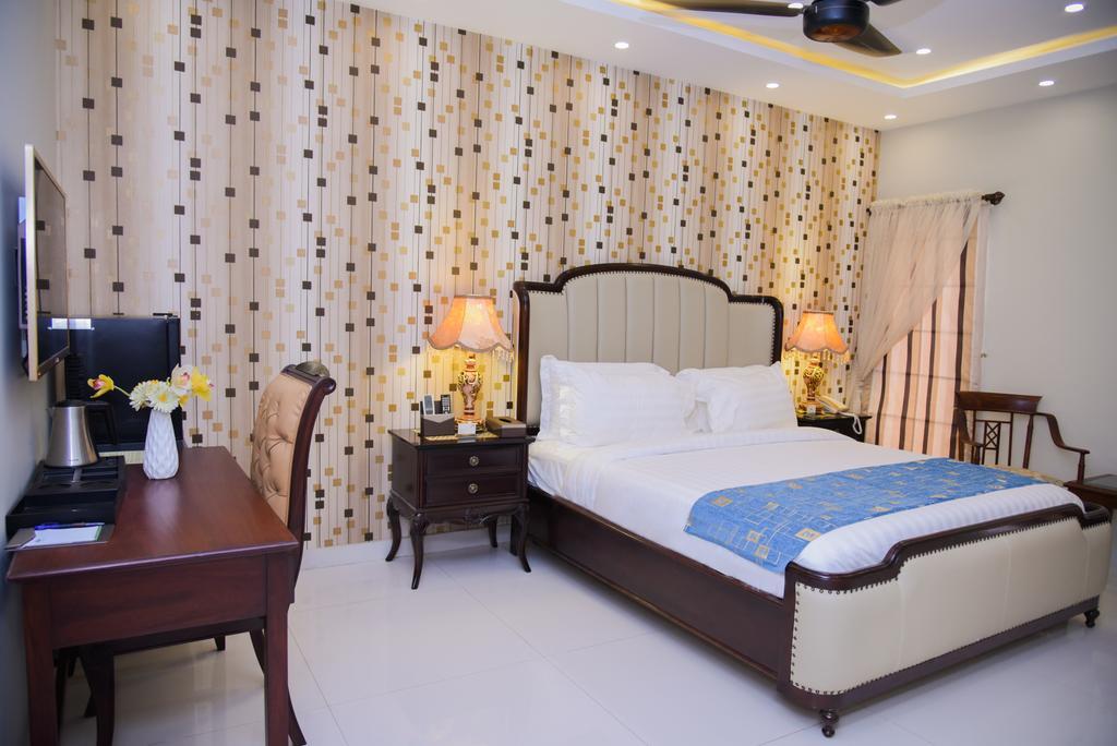 Orchards Cottage Hotel Karachi Buitenkant foto